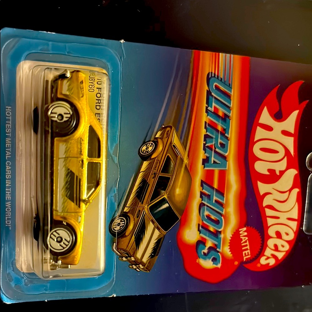 Gold Ford Escort Toy Car